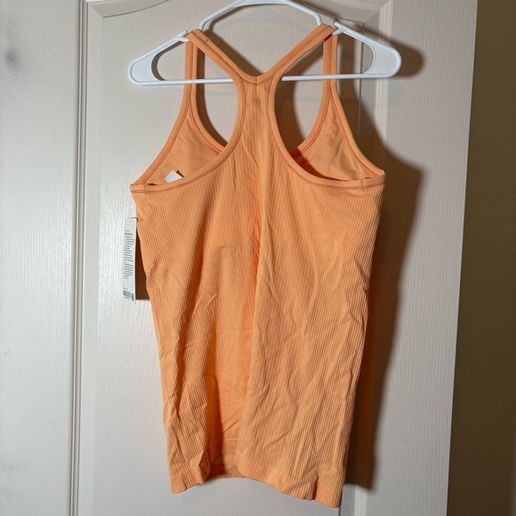 Lululemon Ebb To Street Tank NWT Sz 12 Rock Melon. Hip length - Picture 2 of 5